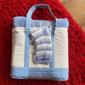 Throw and socks inside matching tote